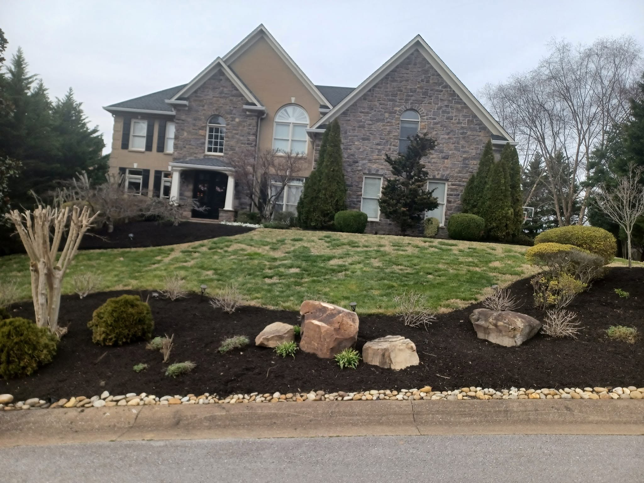 Fresh mulch and planting around home